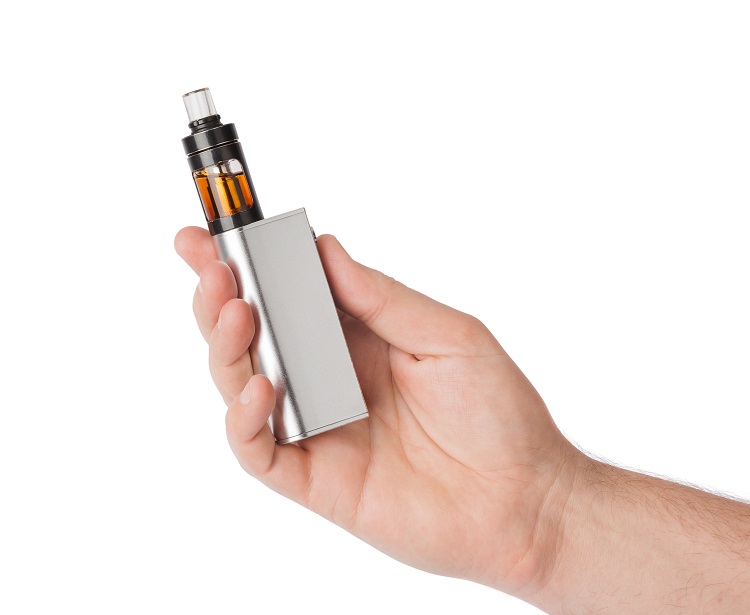 Hand holding a portable vaporizer