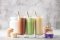 Glasses of protein shakes made from various protein powders, including hemp protein.
