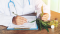 Doctor fills out paperwork on CBD side effects