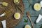 Natural CBD cosmetics – creams, oils and balms with hemp extracts on a wooden background.
