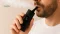 Man holding an Arizer Solo II Max vaporizer.