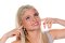 Young woman suffers from tinnitus - ringing, humming, clicking, hissing, buzzing