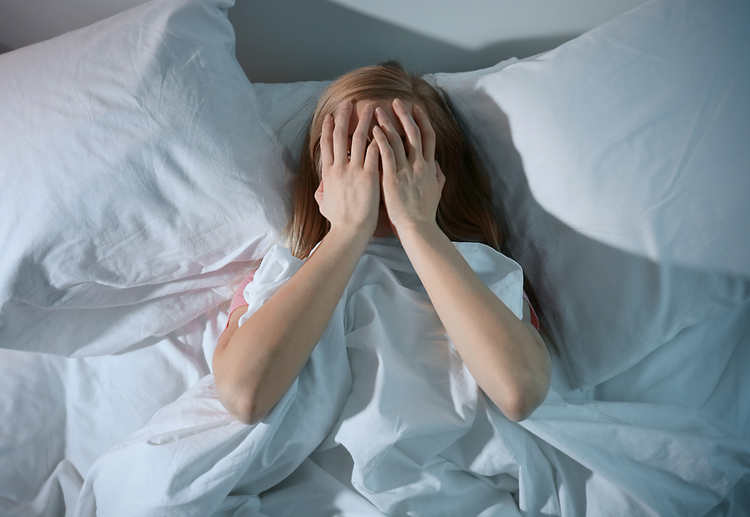 A photograph of a woman who suffers from multiple sclerosis and wakes up several times a night.