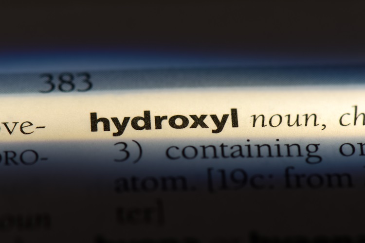 Close-up of a dictionary page with the word 'hydroxyl' highlighted in bold.
